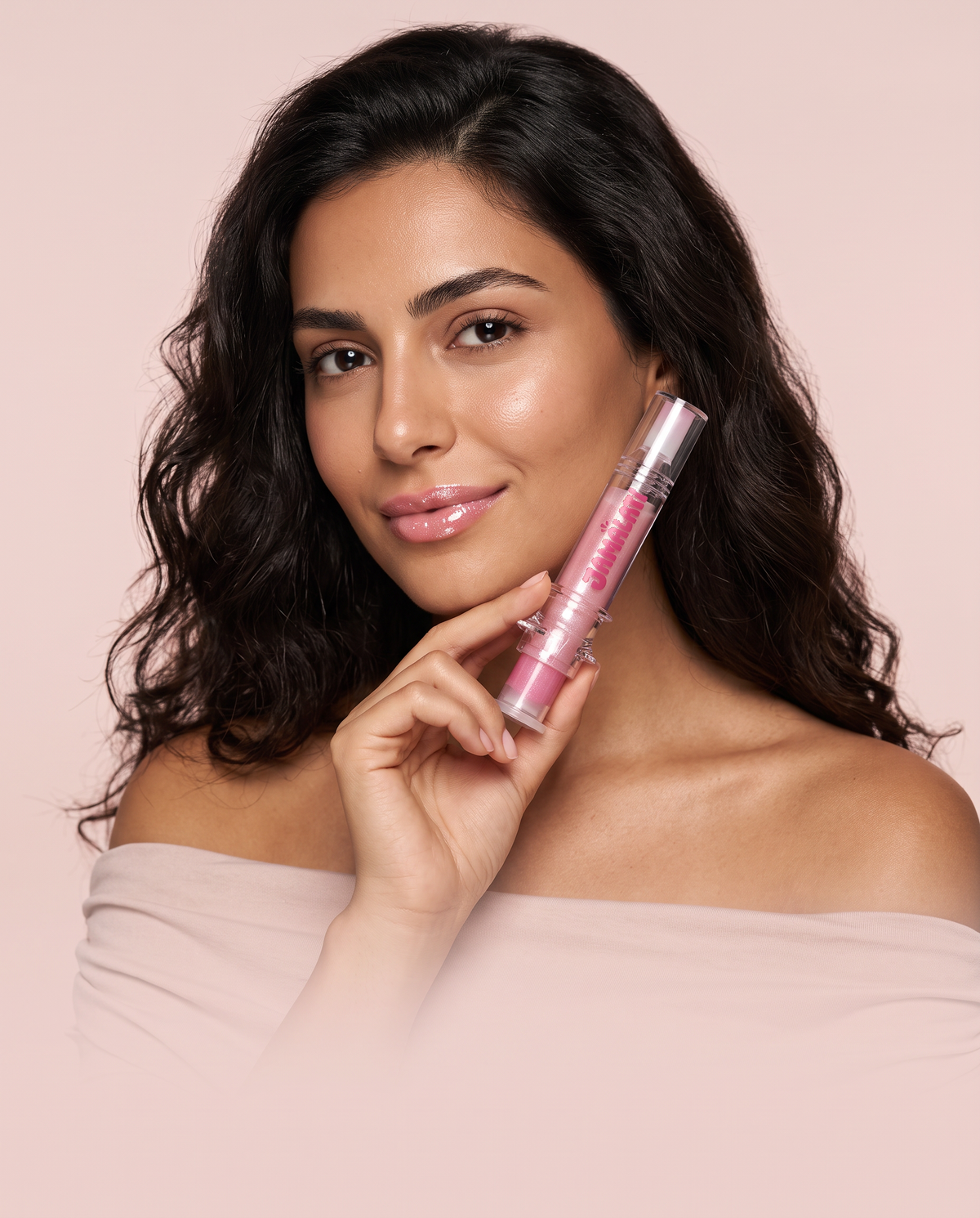 Jamalati lip plumper campaign – model holding Mercury shade